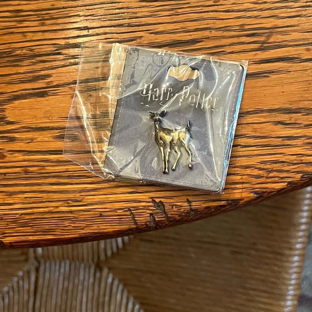 Warner Bros. Gold Doe Patronus Enamel Pin